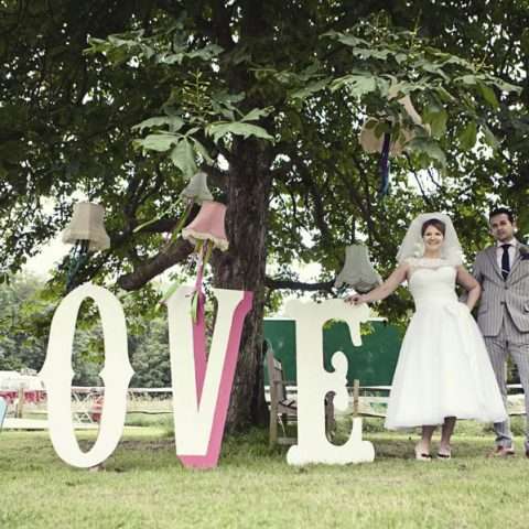 Festival themed wedding at Ridge Farm, Sussex. Photo by Emma Lucy Photography.