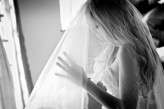 Getting Ready Bride in Veil FIONA CLAIR PHOTOGRAPHY
