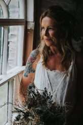 Cool Tattooed B&G Wedding at FForest wearing headpiece(s) from Curious Fair