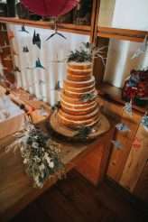 Cool Tattooed B&G Wedding at FForest wearing headpiece(s) from Curious Fair