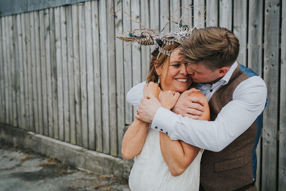Cool Tattooed B&G Wedding at FForest wearing headpiece(s) from Curious Fair