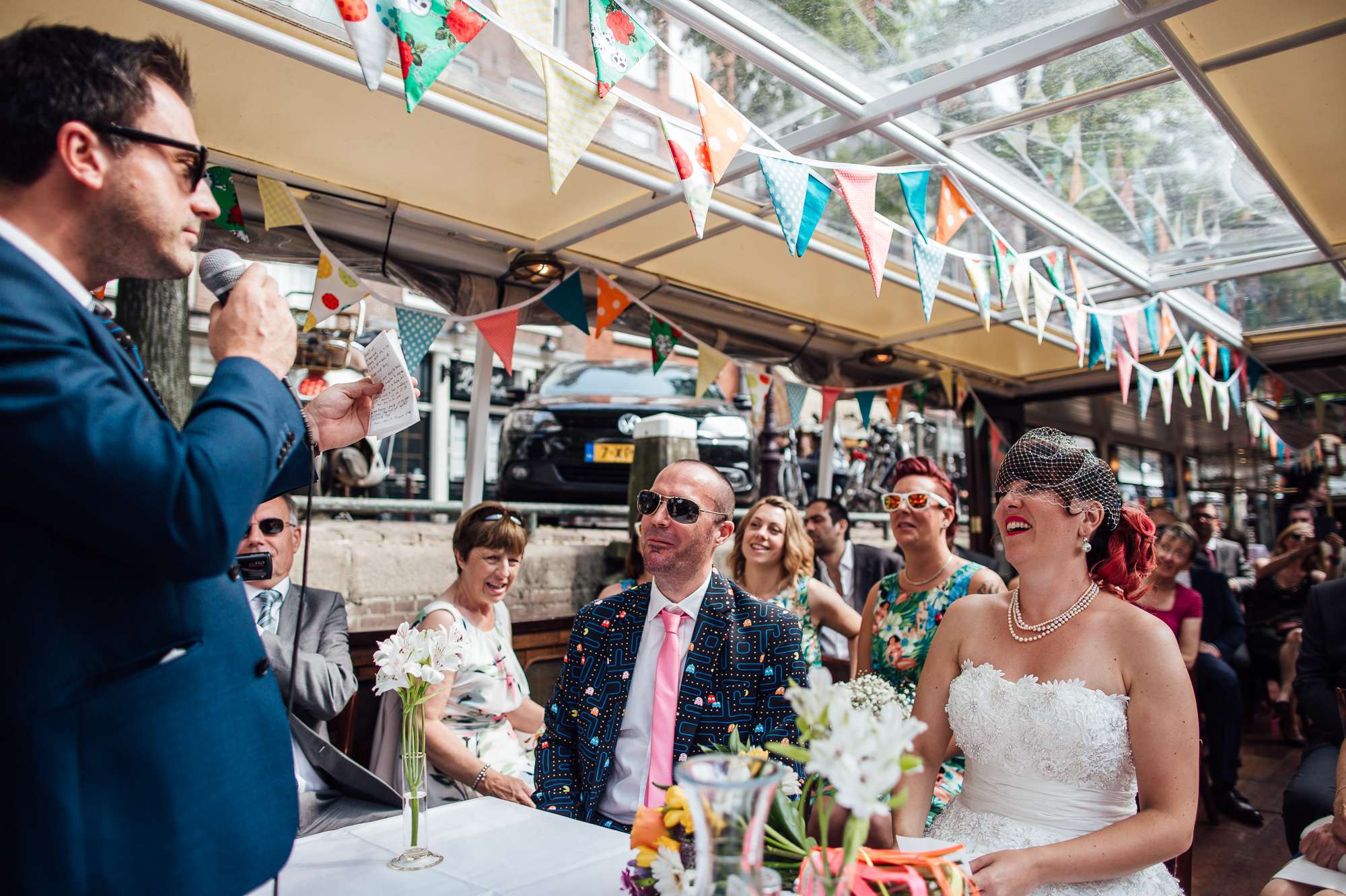 colourful canal boat wedding in amsterdam · rock n roll bride