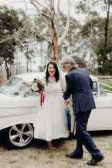 Mid-Century Inspired Rock n Roll Wedding with a DIY Kissing Booth (23)