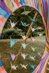 Colourful Bird-Themed Festival Wedding Where EVERYTHING was DIY (1)