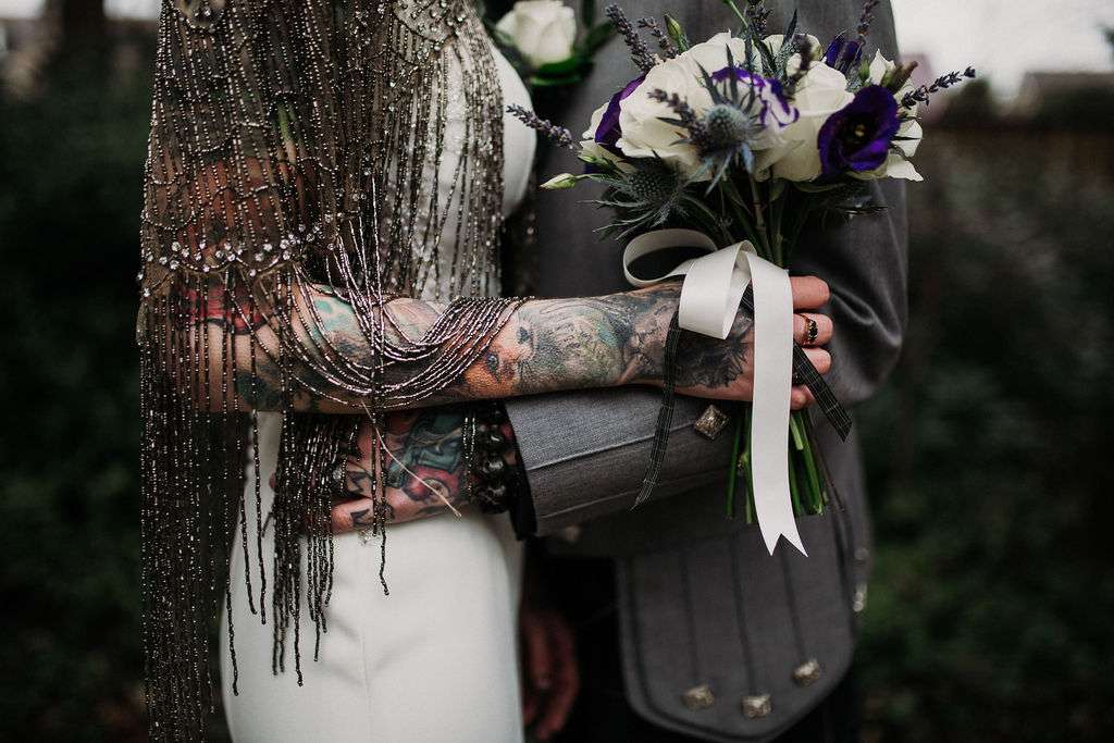 Til Death Do Us Part: Skull Themed Tattoo Artists' Wedding · Rock n Roll  Bride