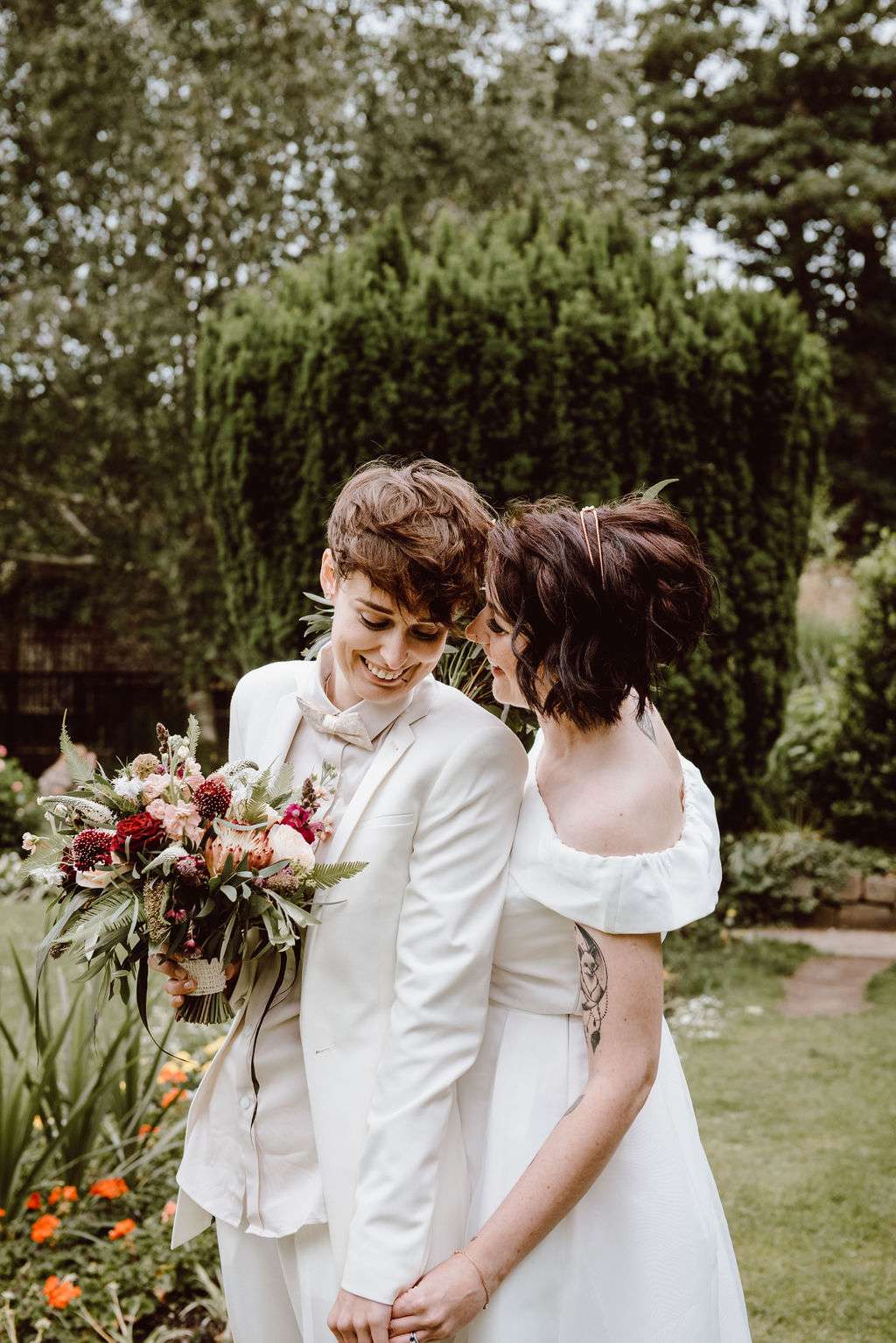 It's 2020 and so planning an LGBTQ wedding shouldn't be any different to planning a straight one. While there have been HUGE, incredible strides made all over the world in the last few years, parts of the wedding industry are still (STILL!) outdated and hetro-normative as fuck. Hayley of Wedding Business School has recently set up a FREE online course for wedding suppliers to help educate and improve the lack of inclusivity and diversity she's personally experienced. Today she's sharing some practical tips and advice on how you can best navigate your wedding planning when you are an LGBTQ couple, too. Hayley, we love you! Over to you...