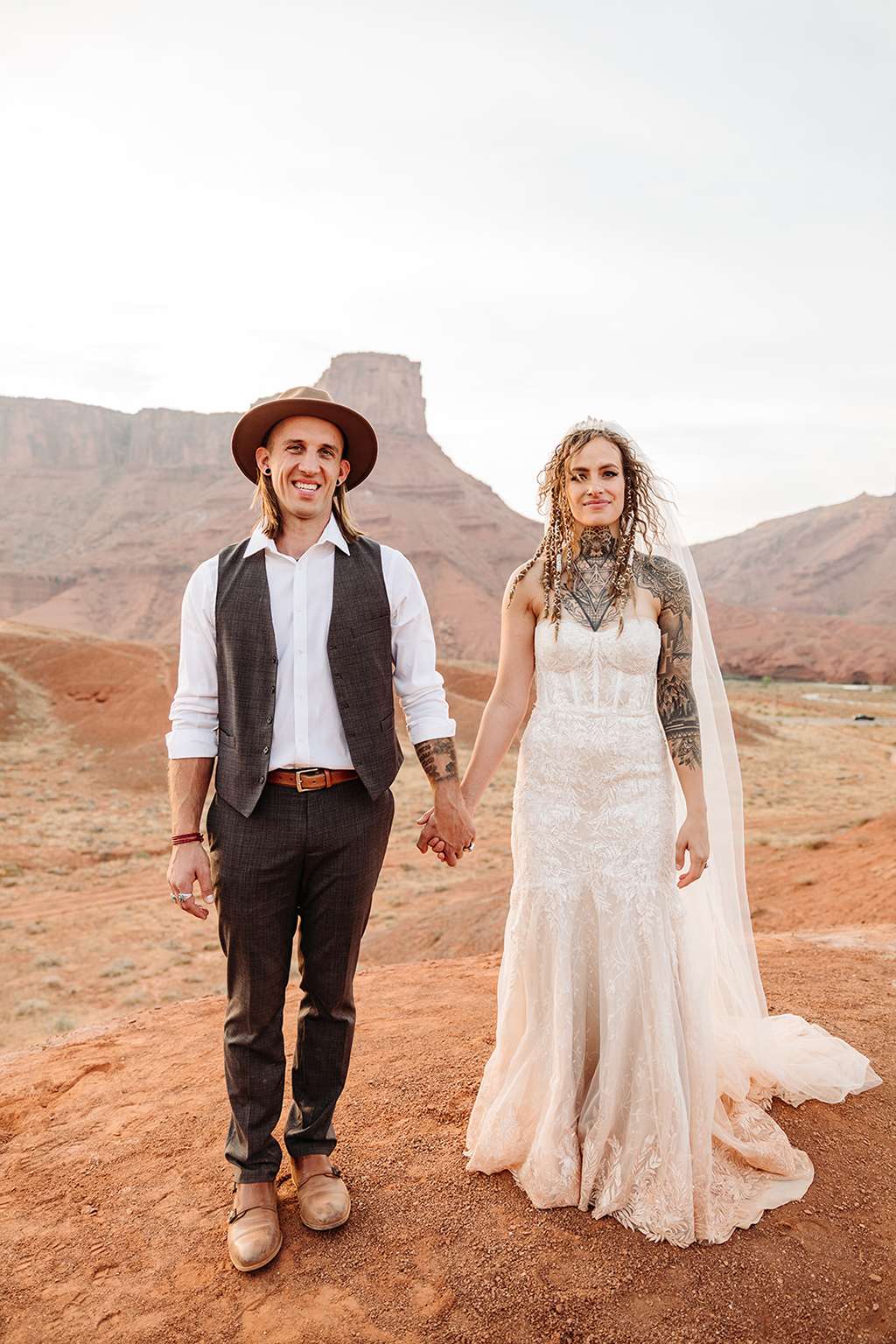 An intimate Las Vegas desert wedding with boho vibes and a spiritual sand  unity ceremony