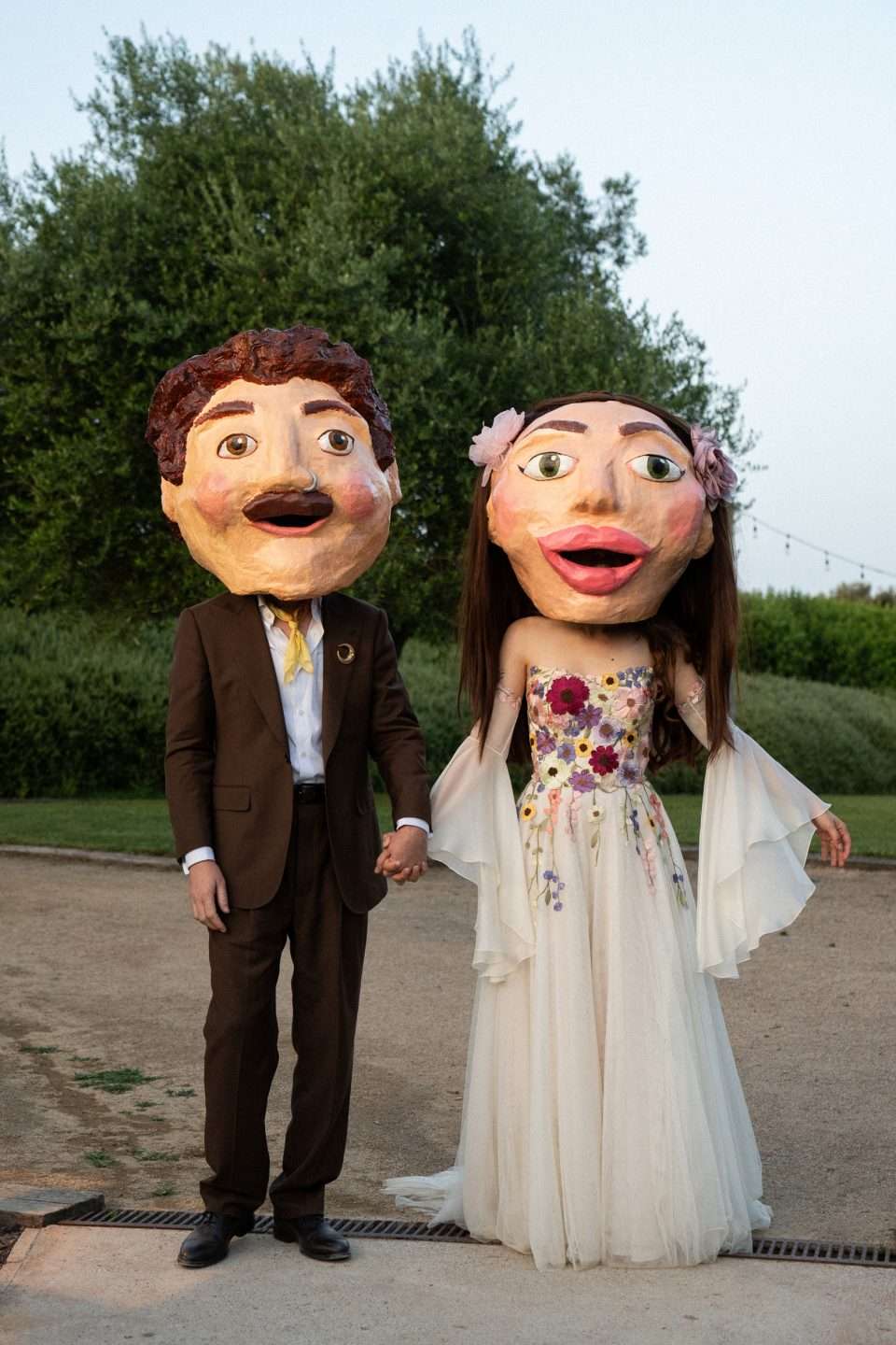 A Midsummer Night’s Dream Meets Midsömmar Wedding with Drag Queen Officiants and the Bride Jumping Out of a Giant Cake!