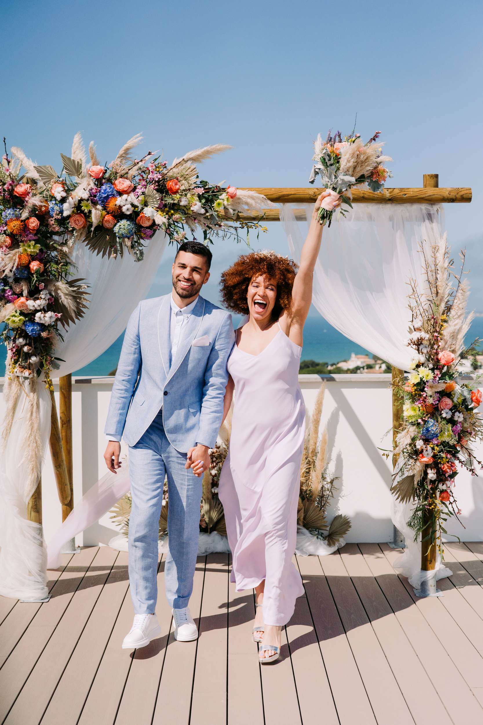 Practical advice for planning a destination wedding that feels personal, from choosing the right location and local planner to guest travel, weather and venue packages
